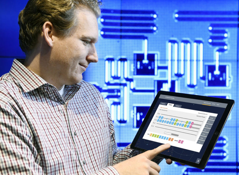A man working on his tablet, cloud computing, IBM Cloud, Google cloud computing, Amazon web services