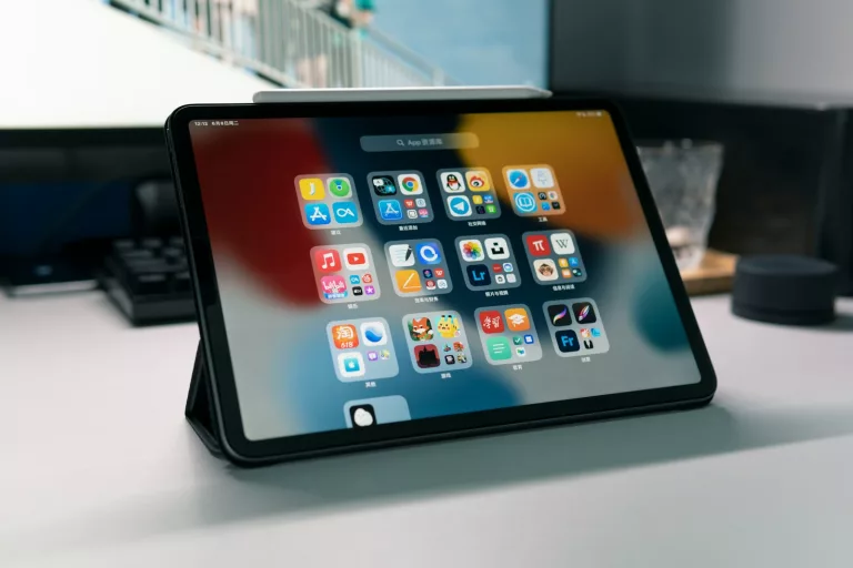 a tablet computer sitting on top of a table, 2-step verification
